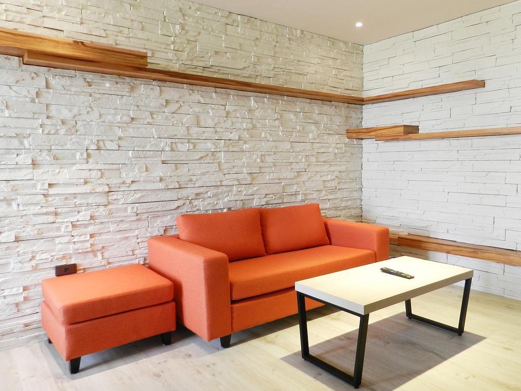 Look Royal Resort Chiayi Exterior foto A modern sofa